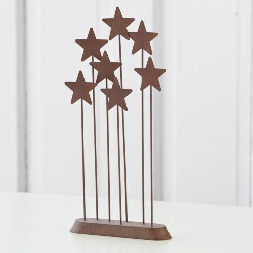 Metal star backdrop for Nativity display with Christmas keepsake styling