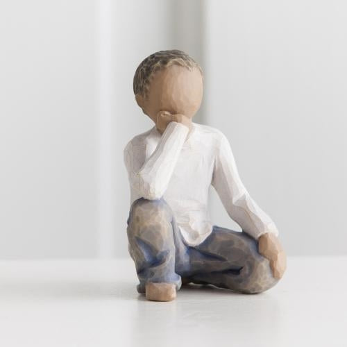 Inquisitive Child darker skin tone figurine as a curious child keepsake