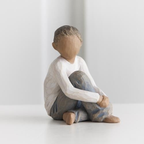 Caring Child darker skin tone figurine as a nurturing child keepsake gift