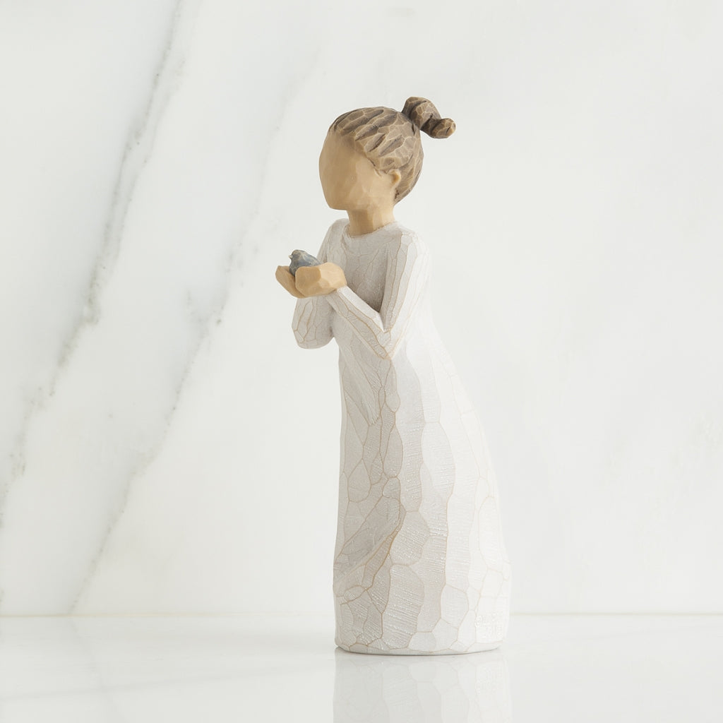 Nurture figurine displayed as a caregiver and encouragement keepsake gift