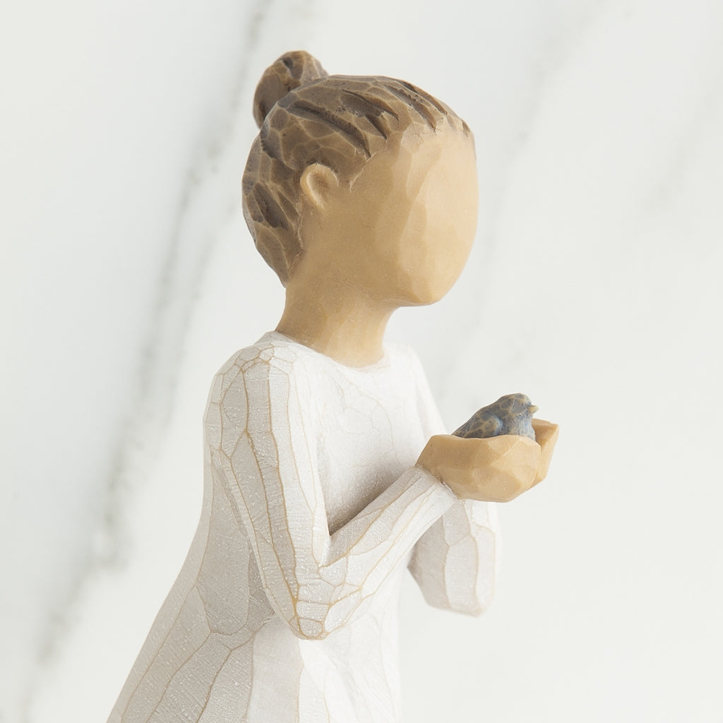 Nurture figurine displayed as a caregiver and encouragement keepsake gift