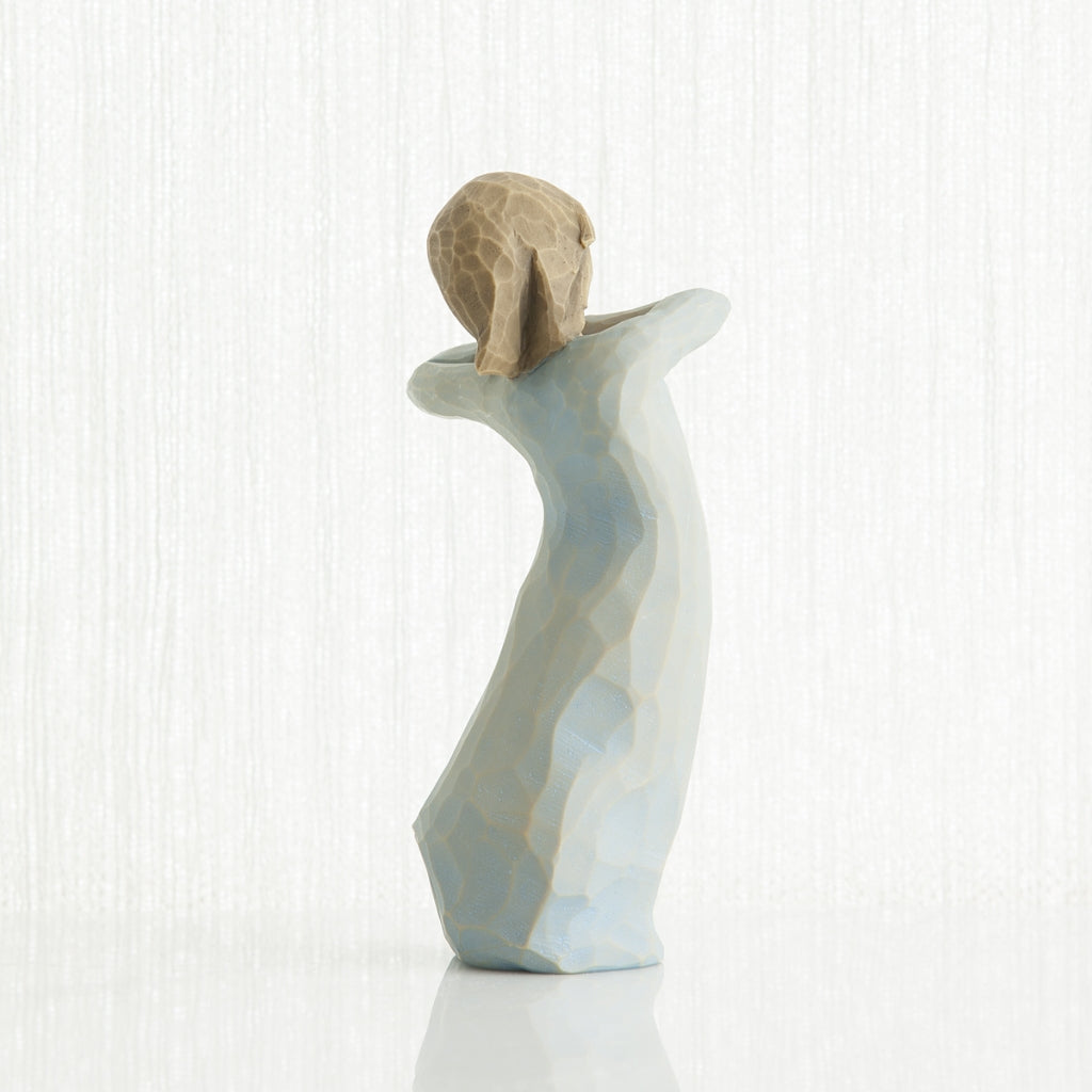 Journey figurine displayed as a new beginning and encouragement keepsake gift