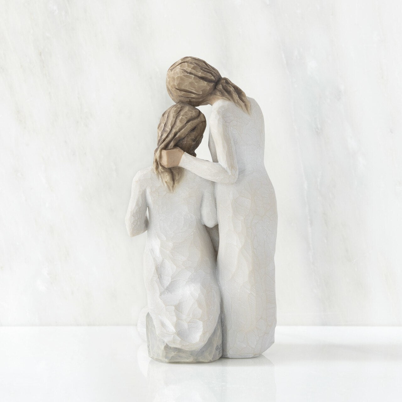 Our Healing Touch figurine displayed as a sisterhood and support keepsake gift