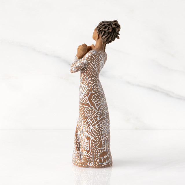 Detail view of Music Speaks Figurine – Darker Skin Musician Gift for musicians and performers