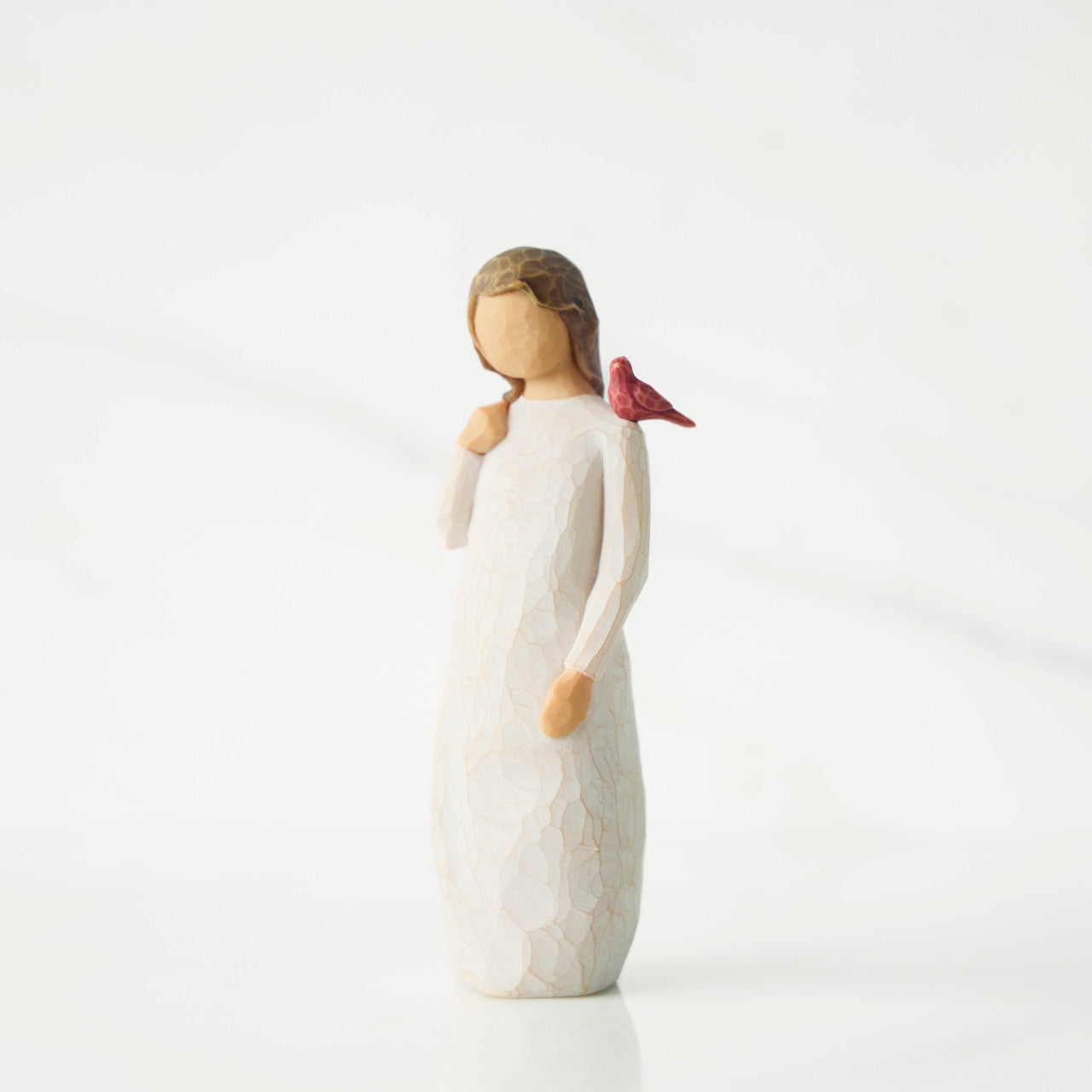 Messenger with Cardinal figurine as a comfort and remembrance gift