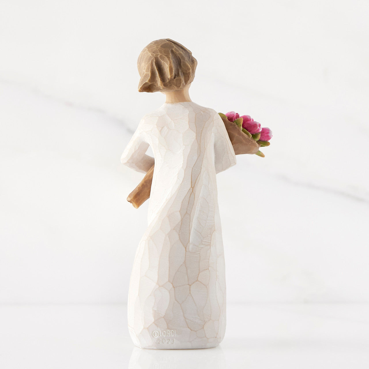 Bright Hope figurine with tulips as a confidence and encouragement gift